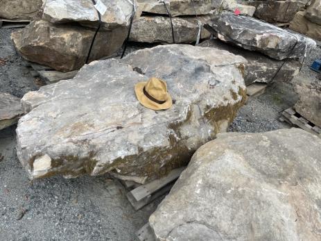 The centerpiece “Sitting Stone” boulder