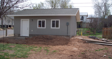 The new garage, with the pile of orange clay subsoil in front that  would become Garage Hill.