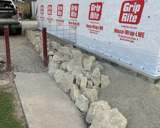 Placing the rocks for the crevice garden.