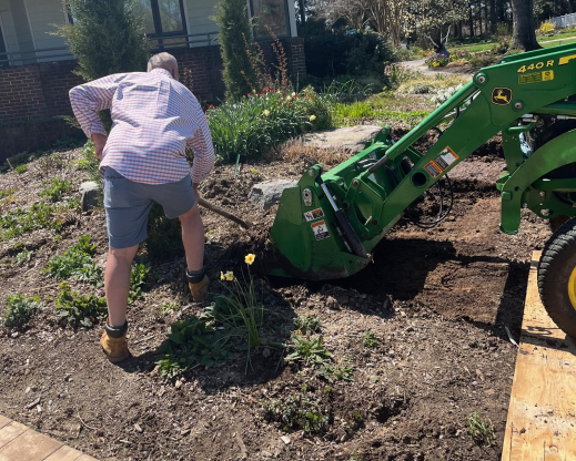 Regrading the new garden space