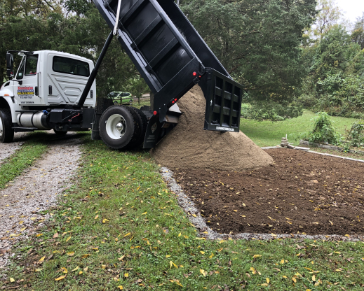Bringing in the sand for the garden
