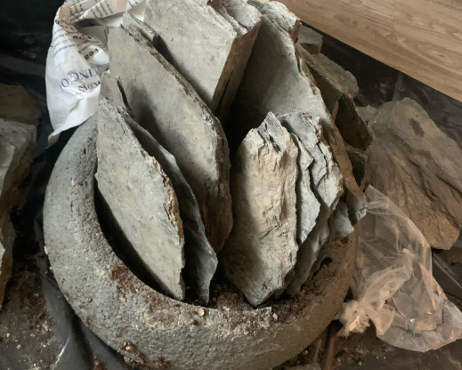 The process of building a crevice garden in a conatiner. The process of building a crevice garden in a conatiner.